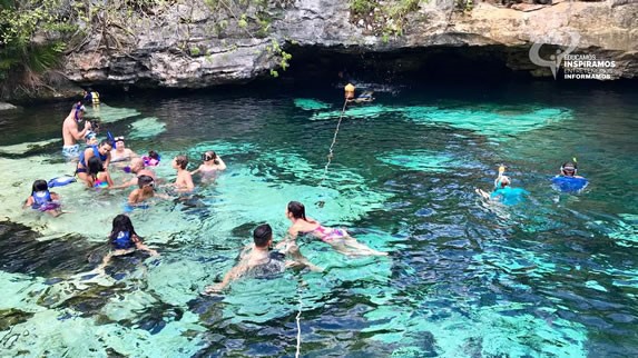 People bathing in the Cenote Azul