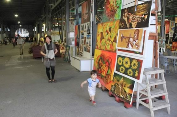 Exhibition of paintings inside the warehouses
