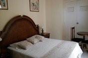 Double room with wooden furniture