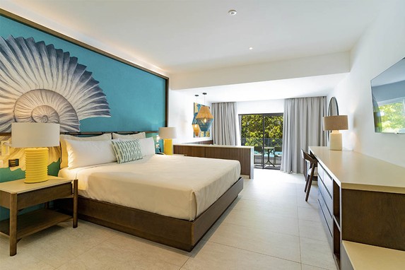 Caribe Deluxe Princess - suite con cama y terraza