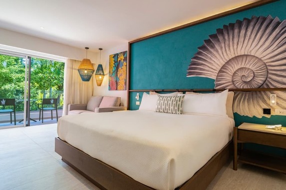 Caribe Deluxe Princess - cama y balcón