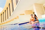 Couple enjoying hotel pool