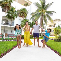 Family walking through the hotel