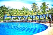 View of the pool of the hotel Dos Playas Faranda
