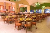 restaurant with wooden furniture in the hotel
