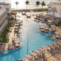 Aerial view of the hotel and pools