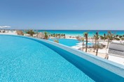 Pool overlooking the beach at the hotel