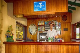 Wooden bar in the lobby of the Villa Karey hotel