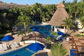 View of hotel pools from a balcony