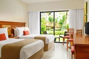 Hotel room with small terrace to hotel gardens