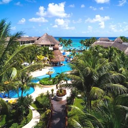 aerial view of hotel pool area amd sea at the back