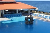 View of hotel pool by the sea