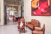 lobby with antique furniture and stained glass 