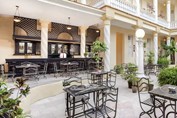 patio with wooden bar and outdoor furniture