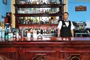 wooden bar with drink bottles