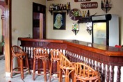 wooden bar with stools at the hotel bar