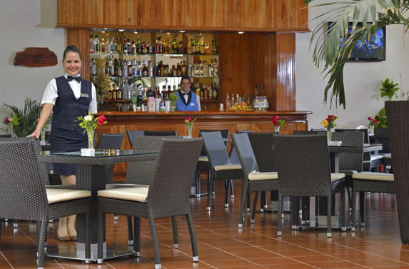 lobby bar with wooden bar and furniture