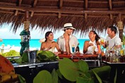 tourists at the beach bar