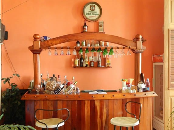 small wooden bar inside the restaurant