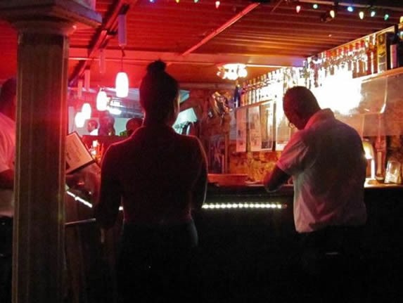 bar decorated with colored lights