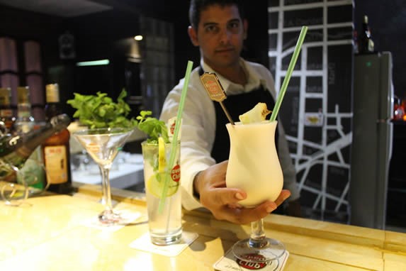 bartender preparing cocktails at the bar