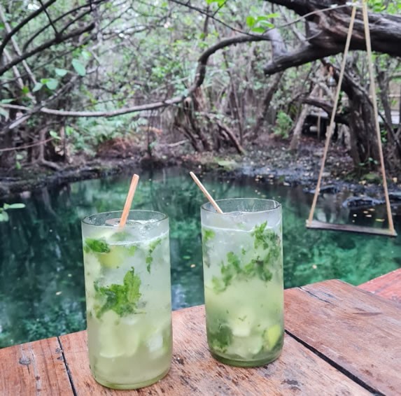 Table overlooking the cenote at the bar