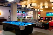 bar with billiards at the Aloft Cancun hotel