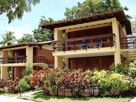 two-story bungalow with wooden roof