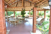 cafe under the guano roof with wicker furniture