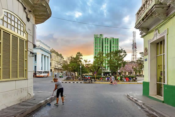 city street surrounded by buildings 