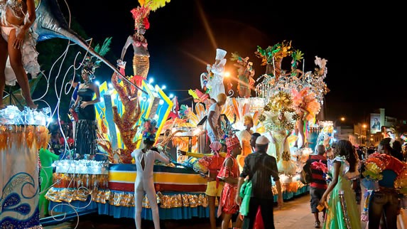 dancers in colorful light float