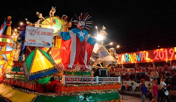 dancers in colorful light float