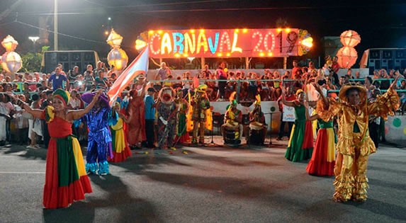 dancers with colorful costumes and accessories