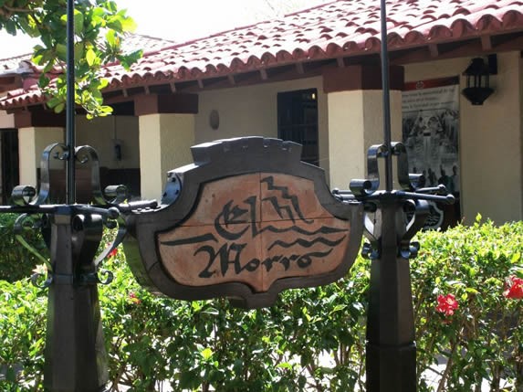 sign at the entrance surrounded by greenery