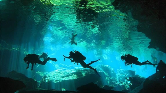 Diving in Cenote Chac Mool
