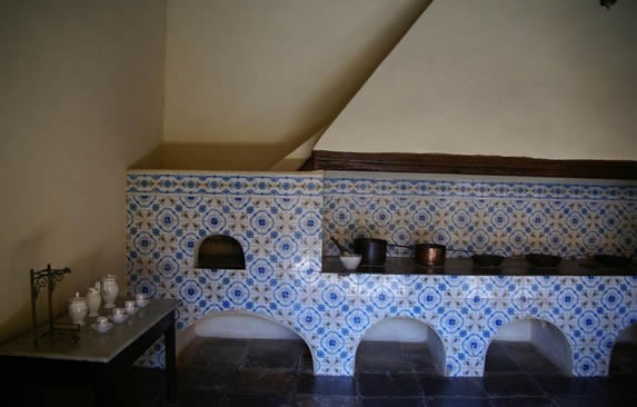 Old kitchen with stoves and cauldrons