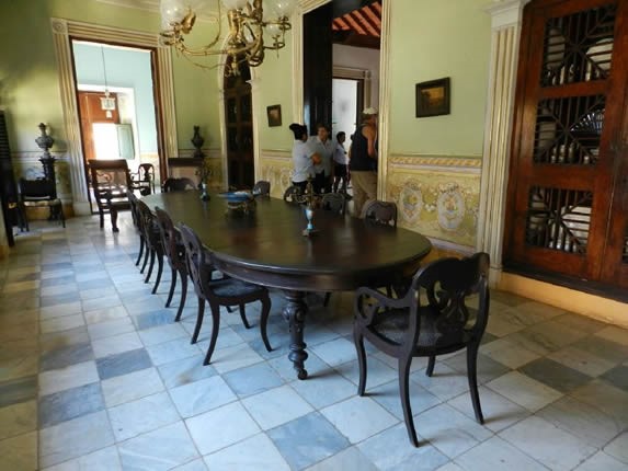 Dining room decorated with antique furniture.