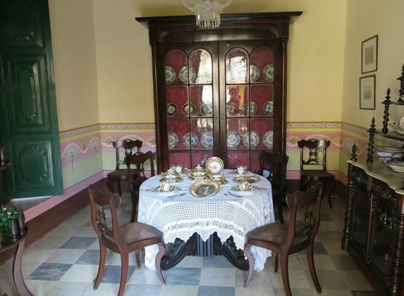 Dining room decorated with antique furniture.