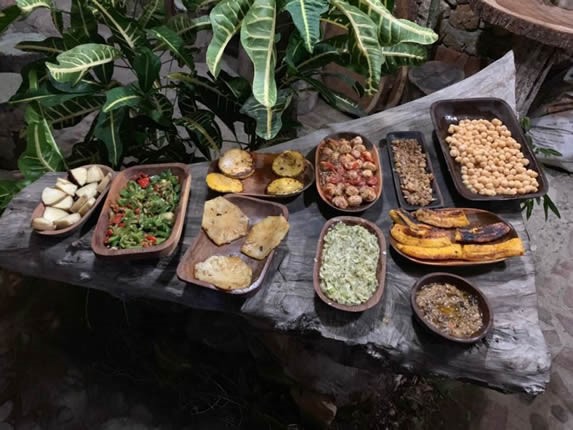 rustic table served with restaurant dishes