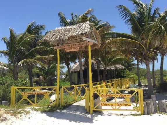 entrance with yellow wooden fence