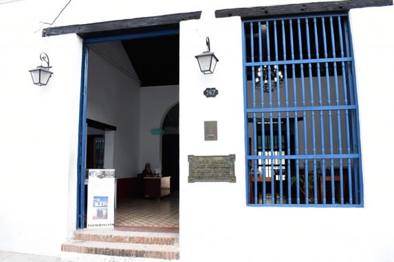 white colonial house entrance