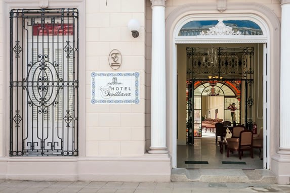 colonial facade with hotel sign