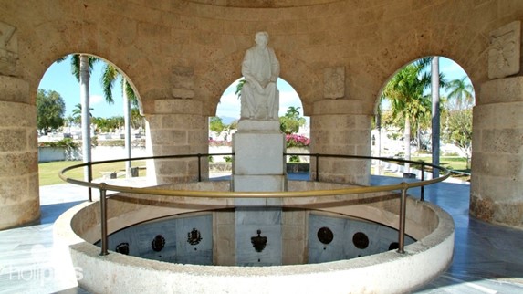 marble sculpture under stone roof