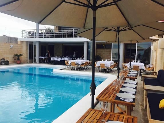 Pool and terrace outside the restaurant