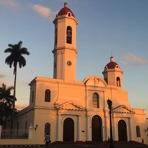 colonial facade of the cathedral at sunset