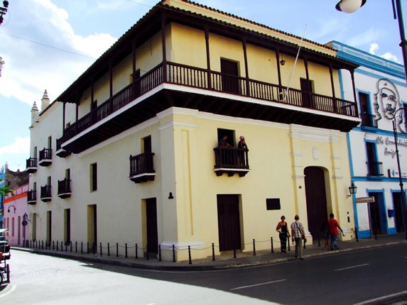 colonial facade with wooden balconies