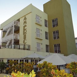 hotel facade with vertical sign