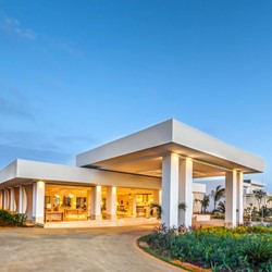 hotel facade surrounded by greenery