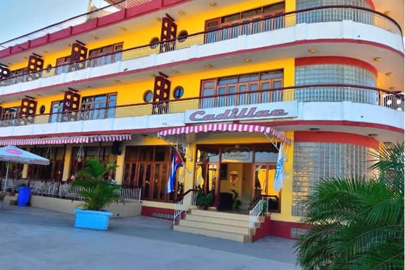 facade of three-story building and terrace