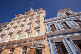 colonial building facade under blue sky